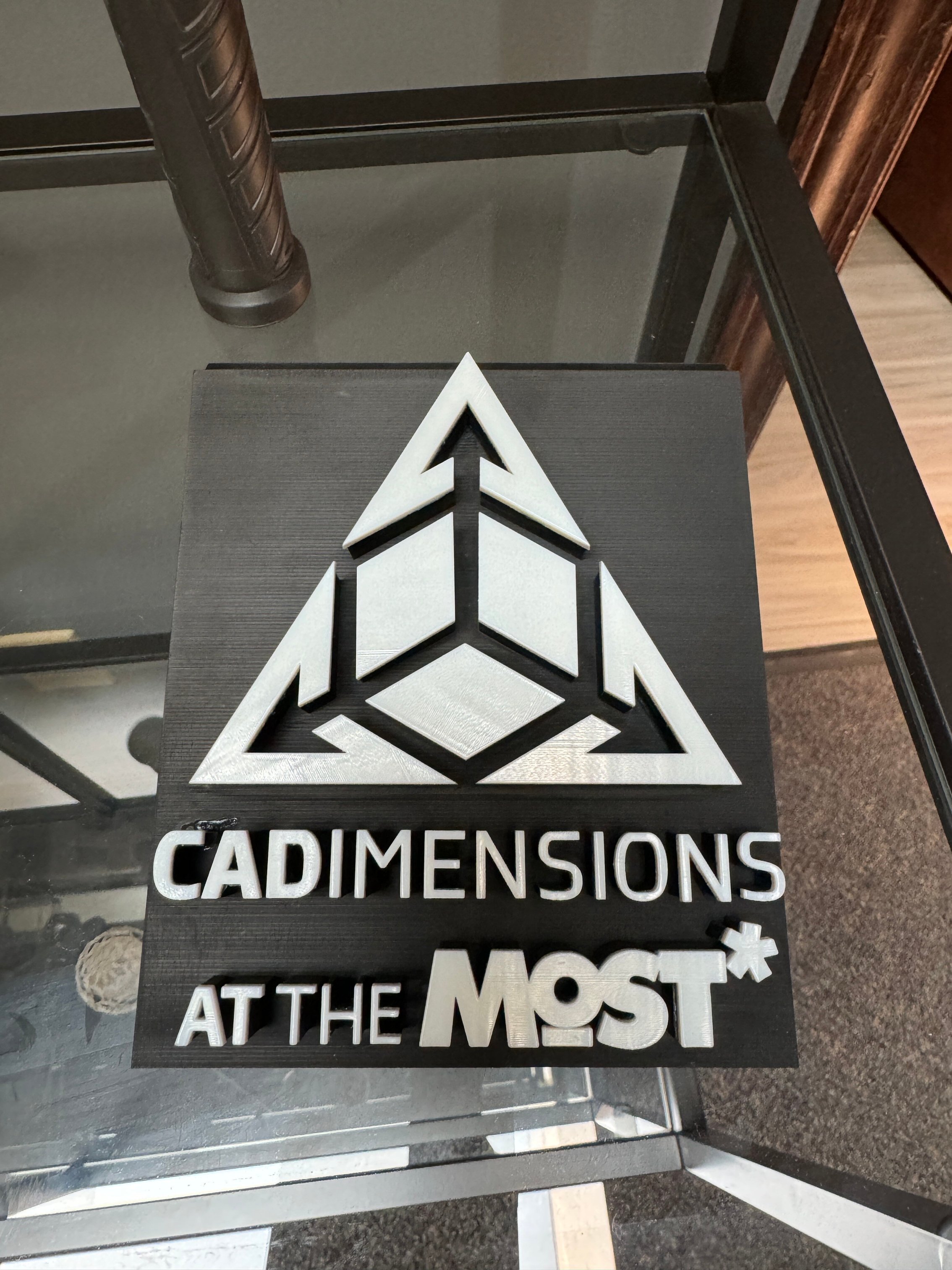 Photo_Of_3D_Printed_CADimensions_and_MOST_Logo