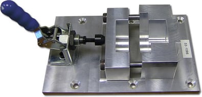 Standard bulky holding fixture that has not been designed for additive example